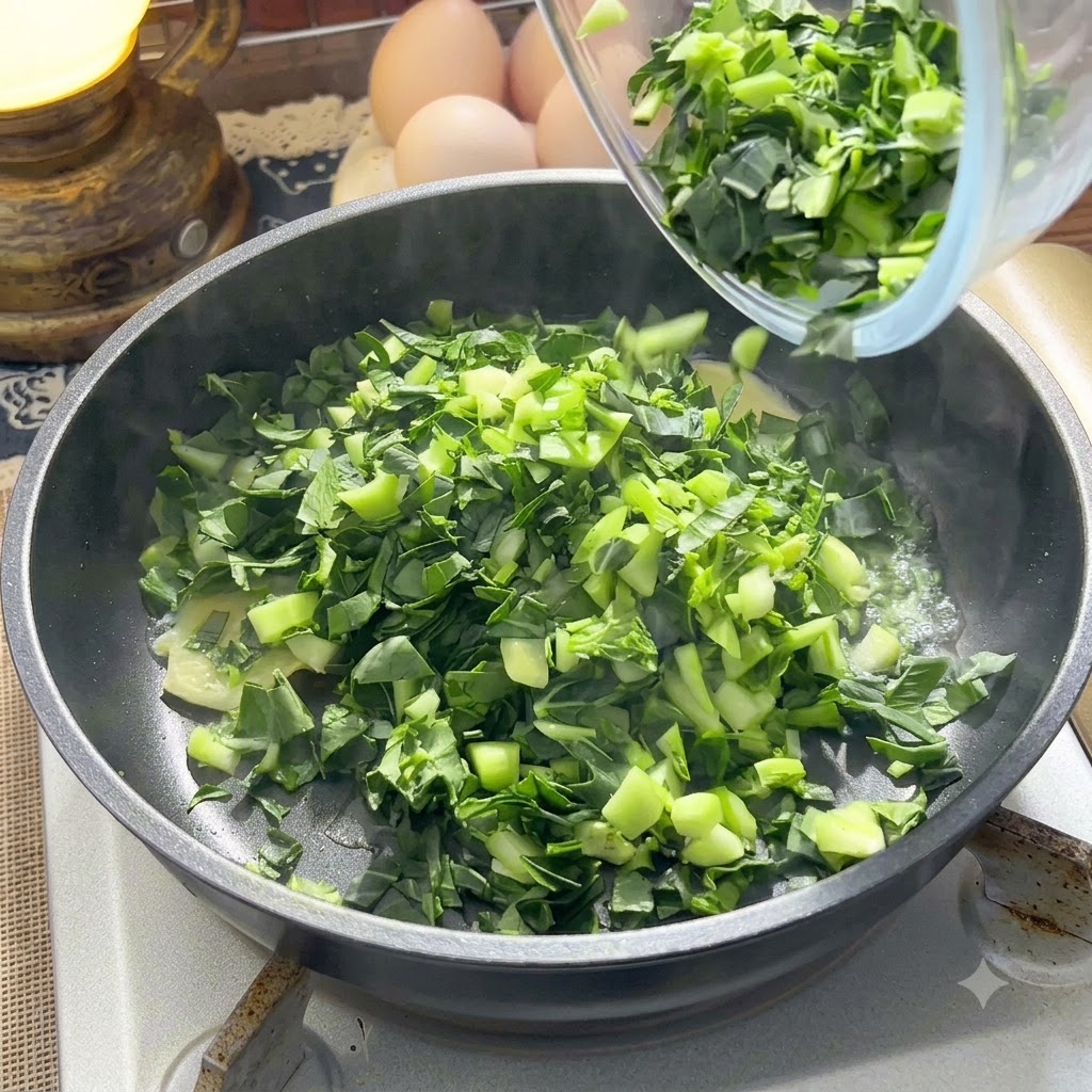 Verduras verdes picadas y jengibre salteándose en una sartén caliente.